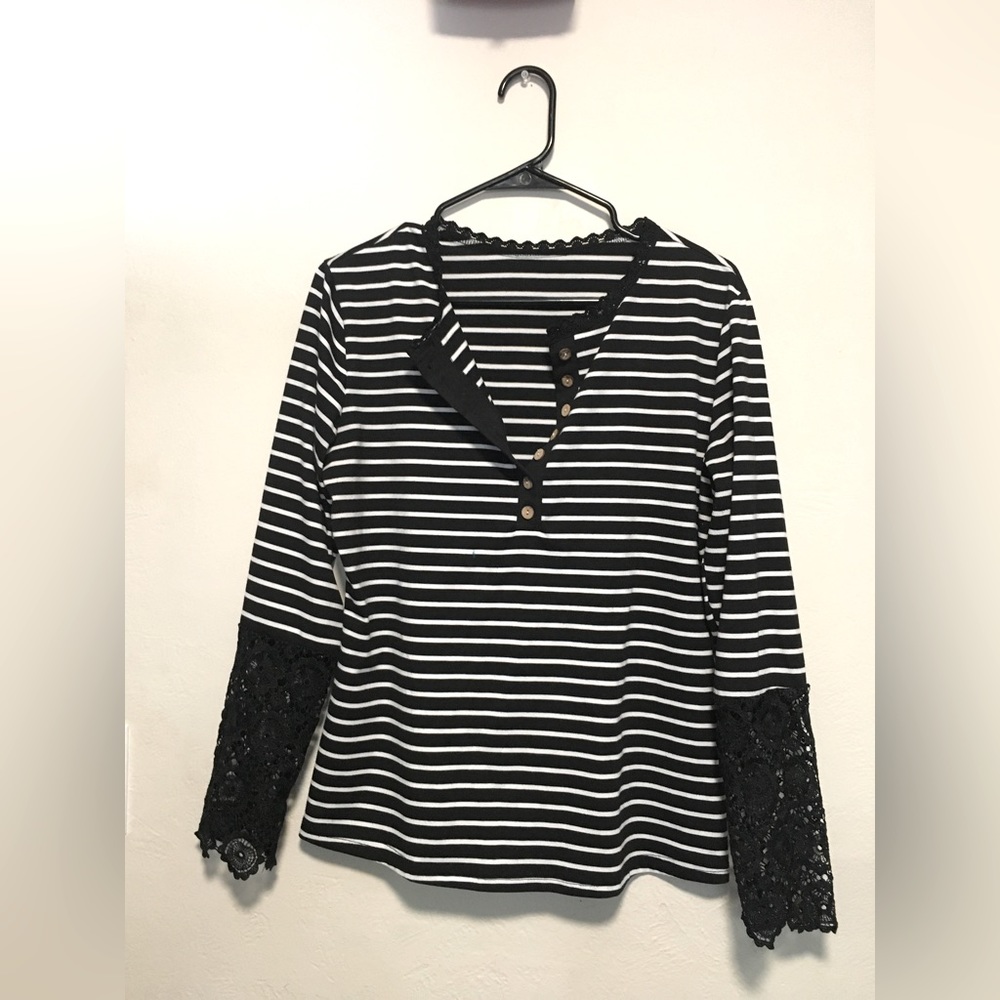 Black and white striped long lace edged sleeves with wooden buttons